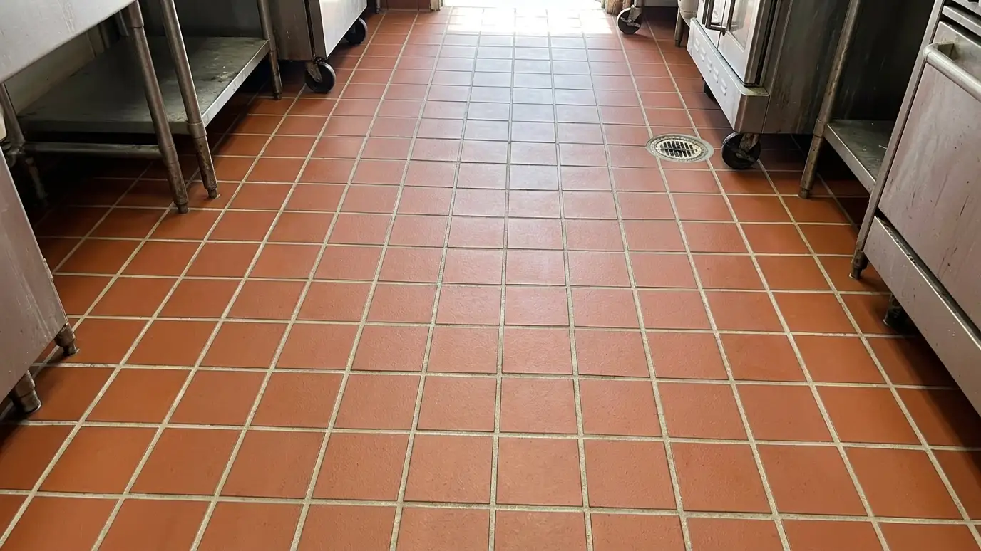 After: Greasy kitchen floor reset | Music City Grout After: a commercial kitchen floor with clean red tile and light grout lines